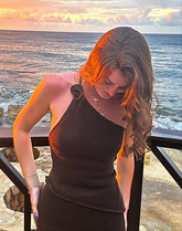 Asymmetrical 1 hand knitt rose top 40 hours of artisan craftsmanship made in  New York.