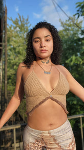 Asymmetrical Khaki crochet top with Fluffy designs.Hand-crocheted— 100% cotton, 40 hours of artisan craftsmanship New York.