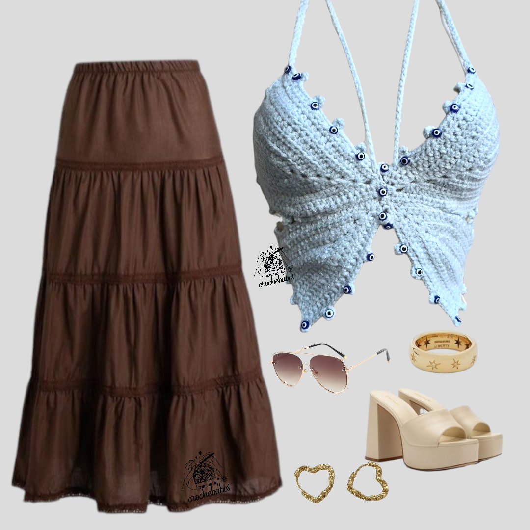 Haut au crochet avec détails papillon et mauvais œil