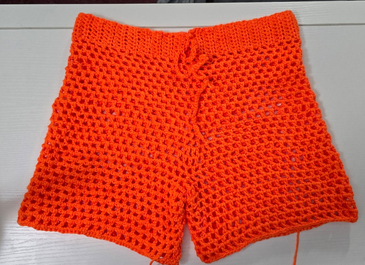 Crochet mesh beach shorts mid-waisted Hand-crocheted— 100% cotton, 20 hours of artisan craftsmanship New York.