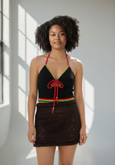 Black rasta Crochet top Hand-crochet top. 100% cotton, 20 hours of artisan craftsmanship. Designed for effortless resort elegance, made sustainably in New York.