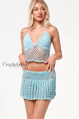 Lisa Hand crochet two pieces set mini skirt and  backless top beach wear.Hand-crocheted— 100% cotton, 40 hours of artisan craftsmanship  made in New York.