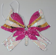 Haut rose à paillettes papillon des années 2000